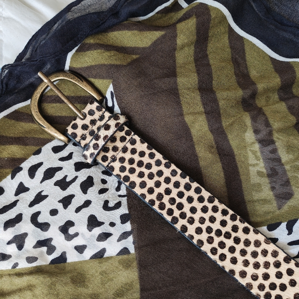 Free People 100% leather and faux calf hair belt.